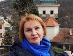 Голова громадської організації «Спілка українців в Маріанських Лазнях» українська письменниця, поетеса та художниця Оксана Заєць